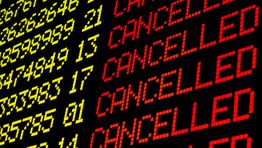 Flight cancellations on an information board